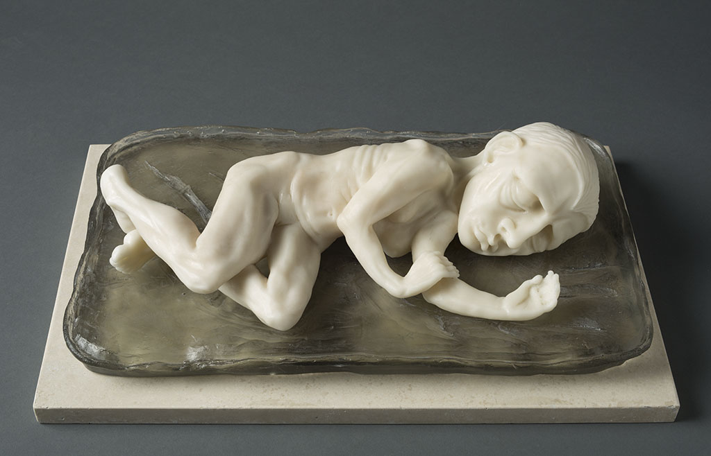 Sleeping Girl, 17″ x 11″ x 6″, carved kiln cast glass, 2014