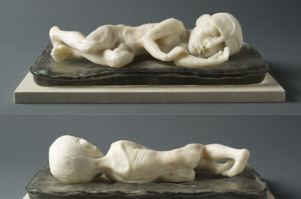 Sleeping Girl, (two views) 17″ x 11″ x 6″, carved kiln cast glass, 2014